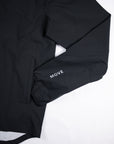 Side pocket and sleeve detail of the black MOVE Sport Apparel men’s AquaLight jacket.
