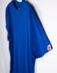 MOVE Sport Apparel men’s Essential Short Sleeve: Surf the Web blue shirt with its original sleeve tab in close view.