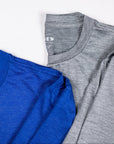 Blue and grey LuxDry tee necklines and fine fabric shown together.