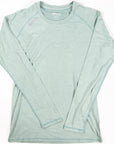 MOVE sport apparel Women's Essential long sleeve shirt in light sage green with raglan sleeves and subtle branding.