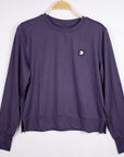 MOVE sport apparel women's purple long sleeve crewneck sweatshirt with ribbed cuffs and side-slit hem