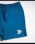 MOVE sport apparel Agility 6 inch training shorts in deep blue with a drawstring waist and reflective logo detail