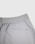 MOVE sport apparel grey perforated training shorts with an elastic waistband and a small zippered back pocket