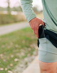 MOVE sport apparel Agility 6 inch training shorts in black with a light grey compression liner and phone pocket