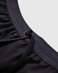 MOVE sport apparel black Agility training shorts featuring an elastic waistband with a secure drawstring closure