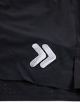 MOVE sport apparel black Agility training shorts featuring a reflective logo detail and perforated fabric texture