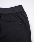 MOVE sport apparel men's black running shorts featuring a breathable waistband and a secure zippered pocket.