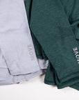 MOVE sport apparel women's essential quarter zip tops in light grey and dark green with reflective logo details