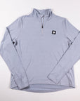 MOVE sport apparel women's light blue quarter zip pullover with reflective logo and long sleeves