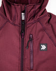 MOVE sport apparel women's burgundy waffle-knit full zip hoodie with a secure zippered chest pocket and raglan sleeves.