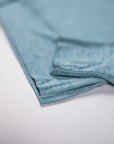 MOVE sport apparel Black Label crewneck sweatshirt in heathered blue with ribbed cuffs and side-slit hem detail
