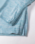 MOVE sport apparel blue heathered long sleeve sweatshirt featuring a ribbed cuff and a modern side-slit hem detail.