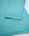 MOVE Sport Apparel women’s Black Label Lightweight Sun Hoodie: Close view of the Aqua Splash cuff and hem seams.