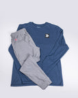 Alternate flat-lay outfit view of grey Essential Joggers and a navy long-sleeve top.