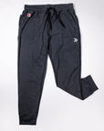 Front view of MOVE Sport Apparel women’s Essential Joggers in Black with original pocket tab and thigh embellishment.