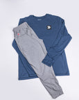 Grey MOVE Sport Apparel women’s Essential Joggers styled with a navy long-sleeve top in a flat-lay outfit.