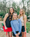 MOVE Sport Apparel women’s Black Label Lightweight Sun Hoodie: Woman wearing Deep Periwinkle sun hoodie in a portrait with friends outdoors.