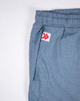 Blue Mirage MOVE Sport Apparel men’s Essential Jogger rear pocket with original white and red embellishment.