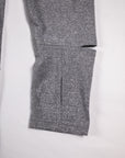Close view of the Heather Classic Gray Essential Quarter Zip Pro sleeve cuff and thumb opening.