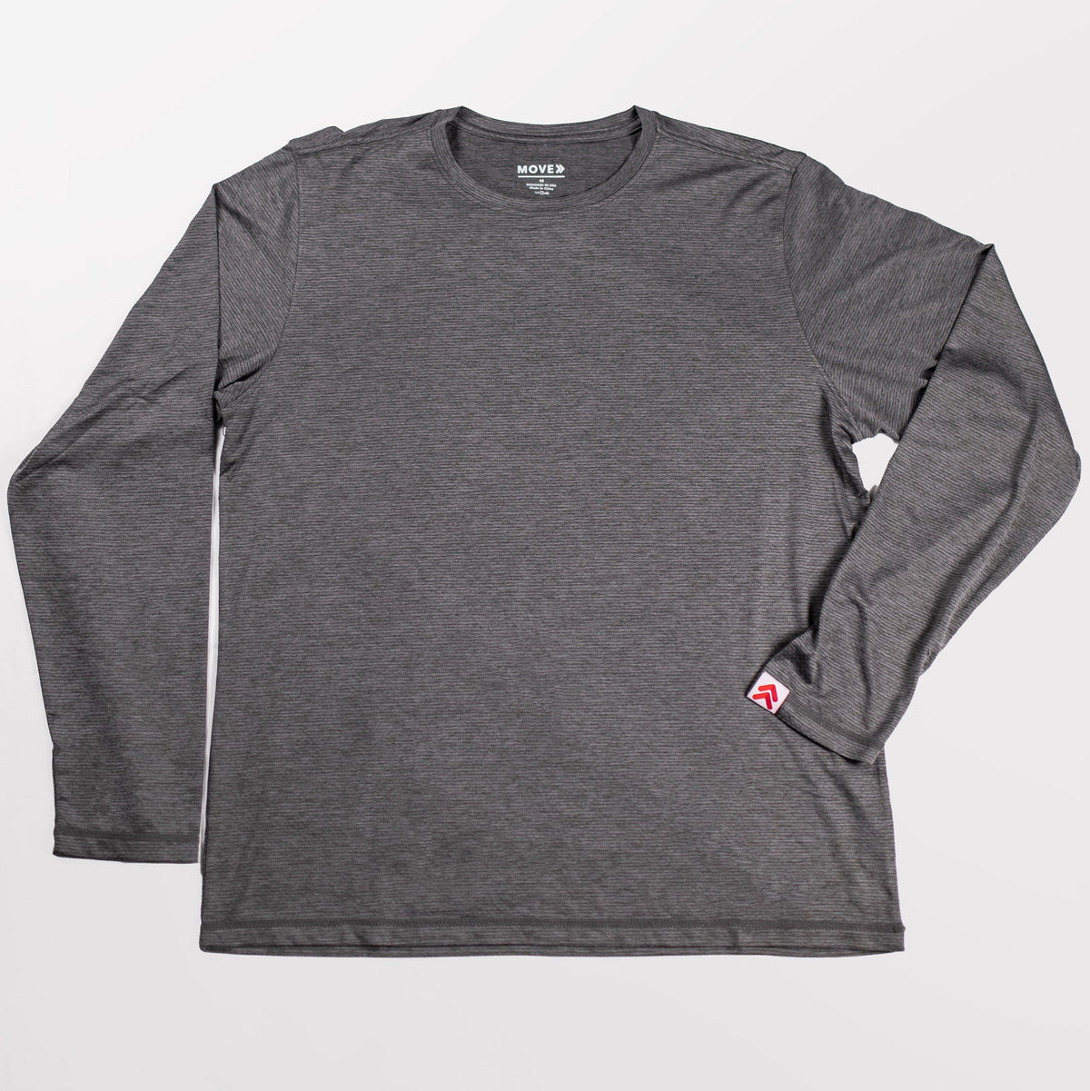 MOVE Sport Apparel men’s LuxDry long sleeve in Volcanic glass shown flat with its original sleeve tab.