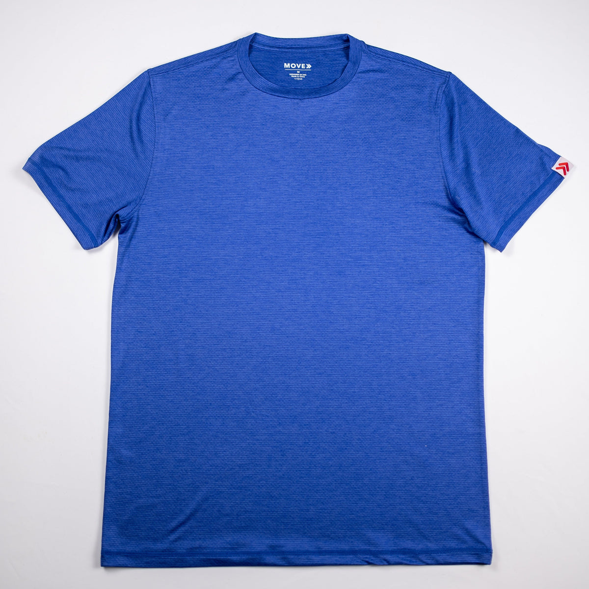 Front view of the Surf the Web blue LuxDry Training T-Shirt with original red-chevron sleeve tab.