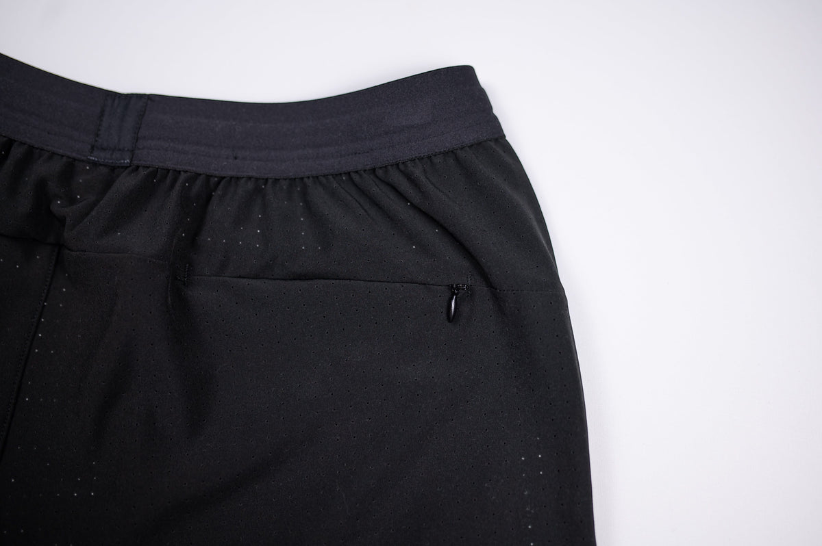 MOVE Sport Apparel men’s Performance 5 Inch Running Shorts: Black shorts waistband and front detail.
