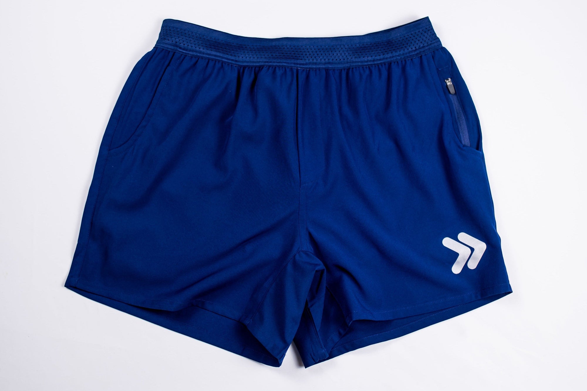 MOVE sport apparel men's royal blue running shorts with breathable waistband, zippered pocket, and white logo detail.