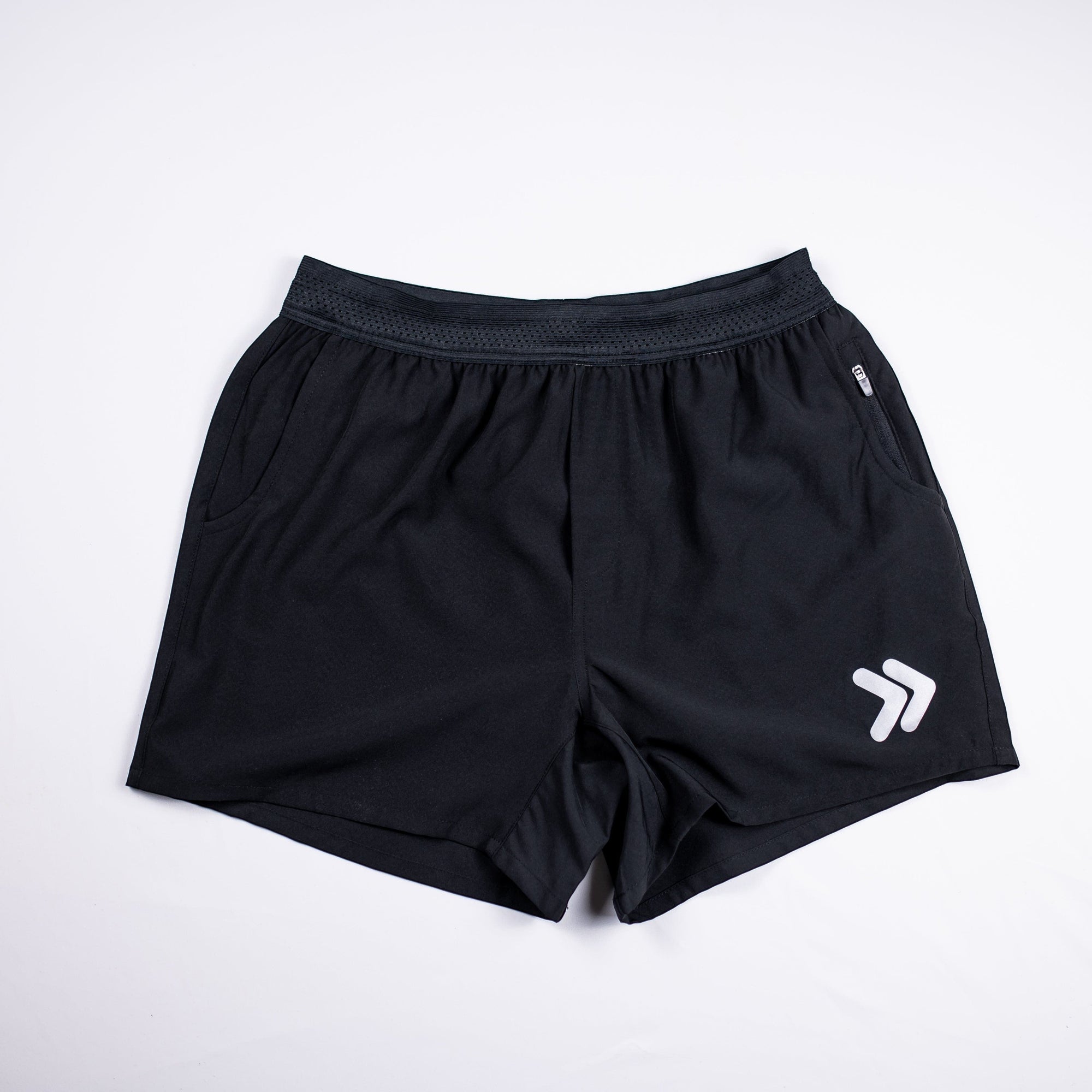 MOVE sport apparel men's black running shorts with a breathable waistband, zippered pockets, and white logo detail.