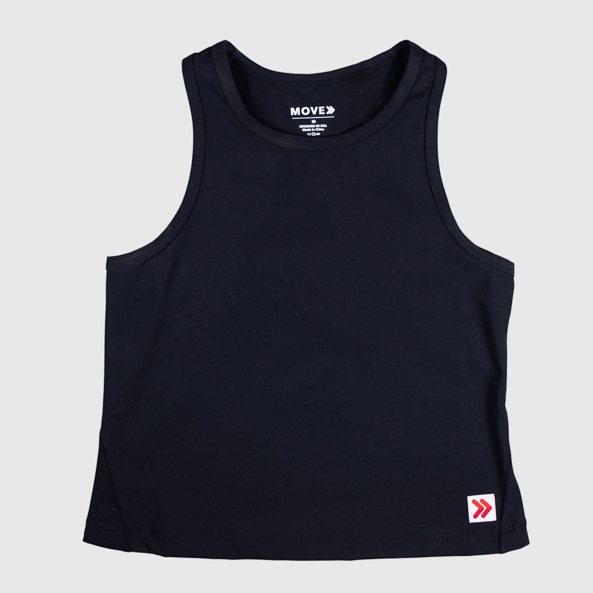 MOVE sport apparel women's black cropped tank top with a high neckline and small red logo patch on the hem.