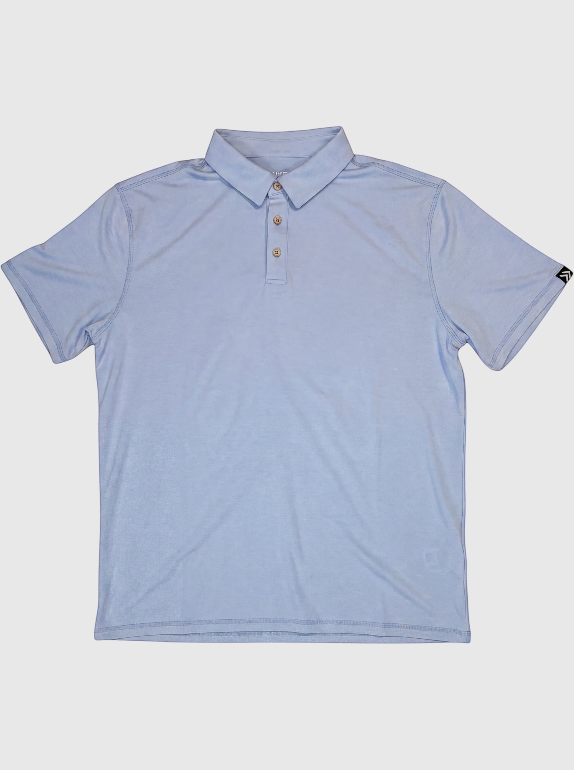 MOVE sport apparel Essential Polo Shirt in light blue, featuring a moisture-wicking fabric and classic button placket.
