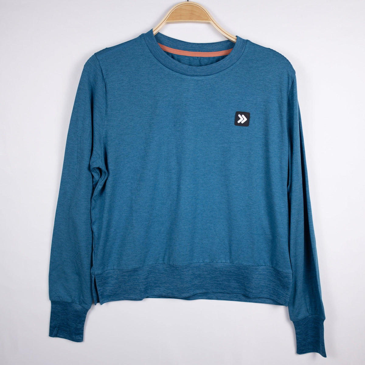 MOVE sport apparel blue heathered long sleeve crewneck sweatshirt with ribbed cuffs and side-slit hem