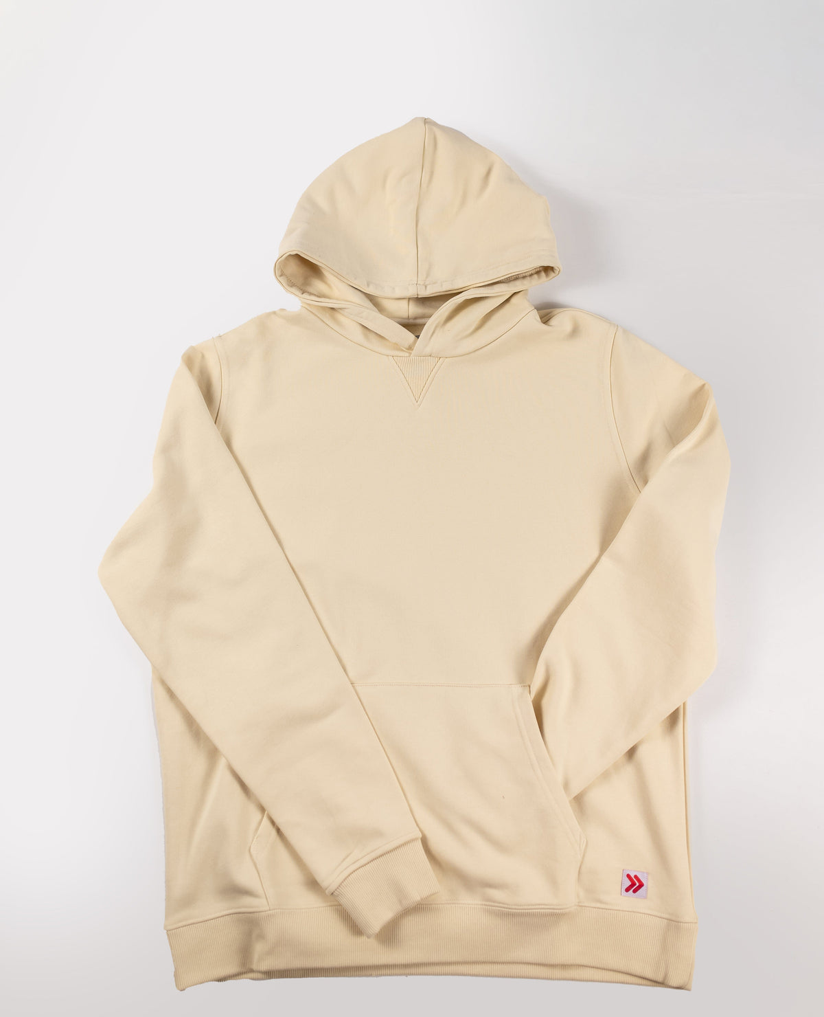 MOVE Sport Apparel French Terry Hoodie in Natural laid flat, showing the hood, kangaroo pocket and original hem label.