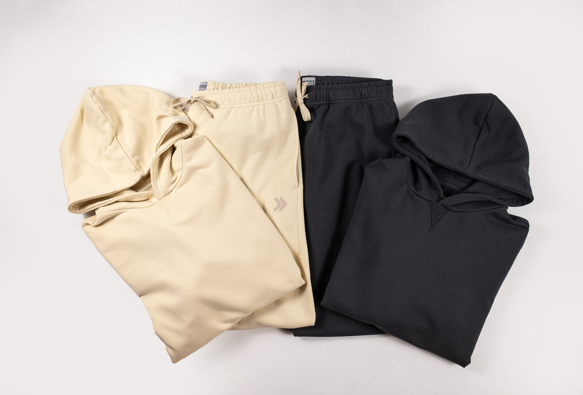 Folded MOVE Sport Apparel French Terry Hoodie in Natural and Volcanic Ash.