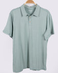 MOVE sport apparel Essential Polo Shirt in sage green moisture-wicking fabric with a classic collar and button placket