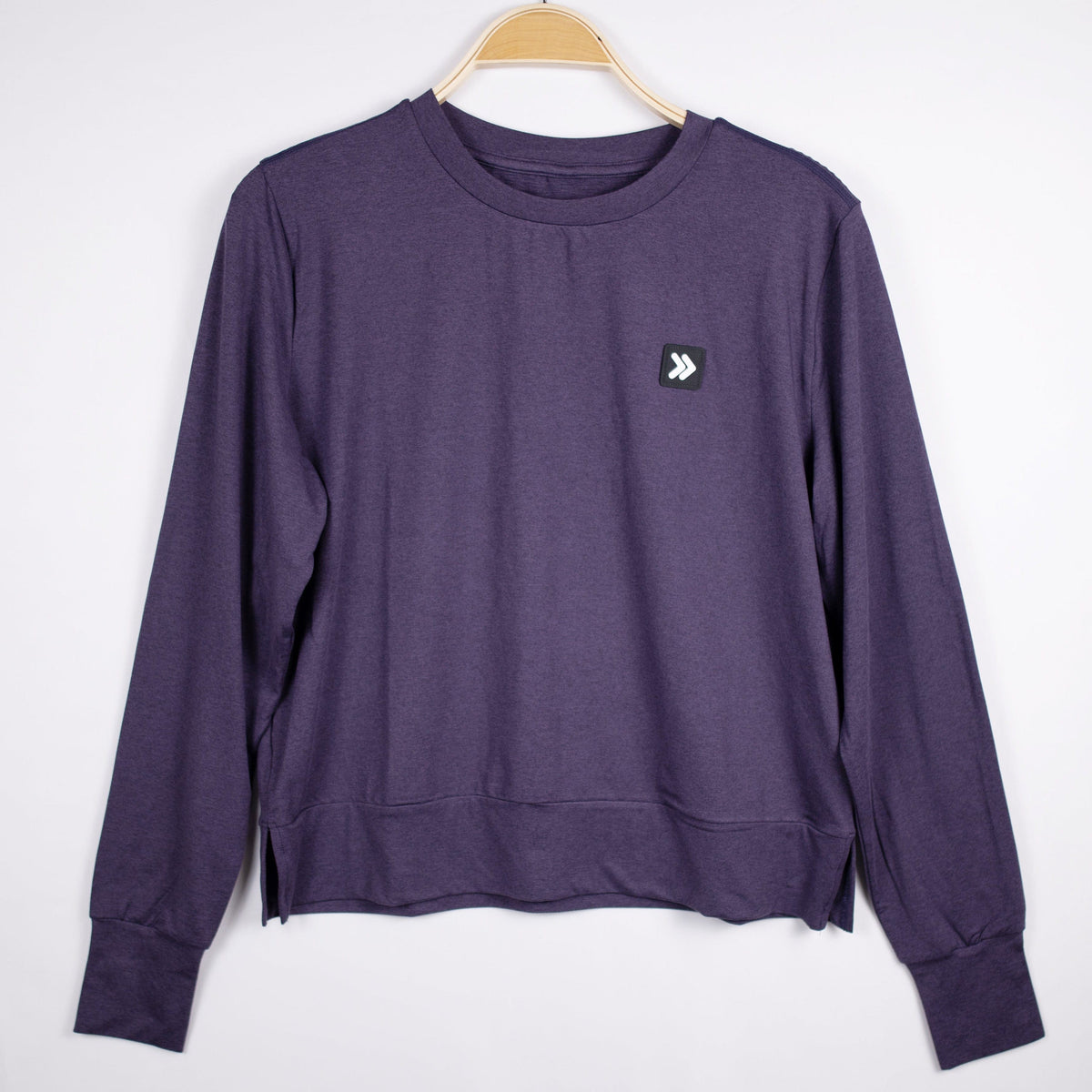 MOVE sport apparel women's purple long sleeve crewneck sweatshirt with ribbed cuffs and side-slit hem
