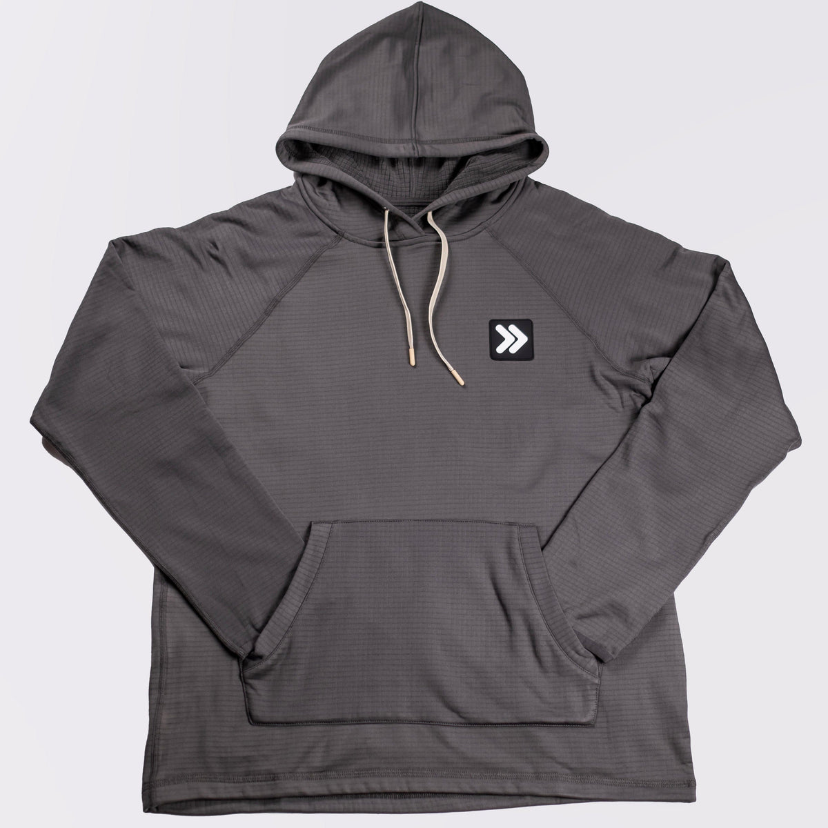 MOVE sport apparel charcoal grey waffle-knit hoodie with raglan sleeves, adjustable hood, and front kangaroo pocket.