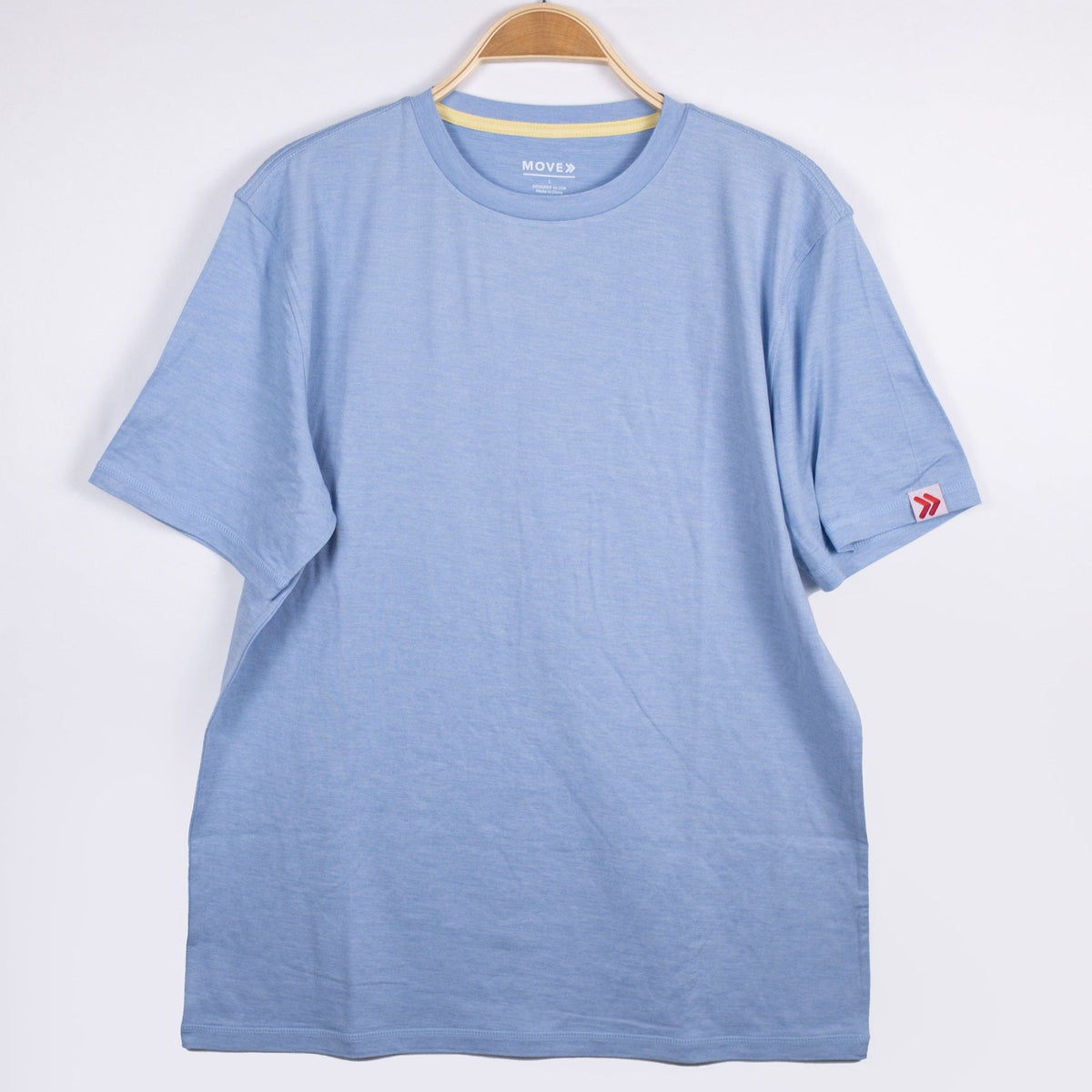MOVE Sport Apparel men’s Essential Short Sleeve: Heather Chambray Blue shirt shown from the front.