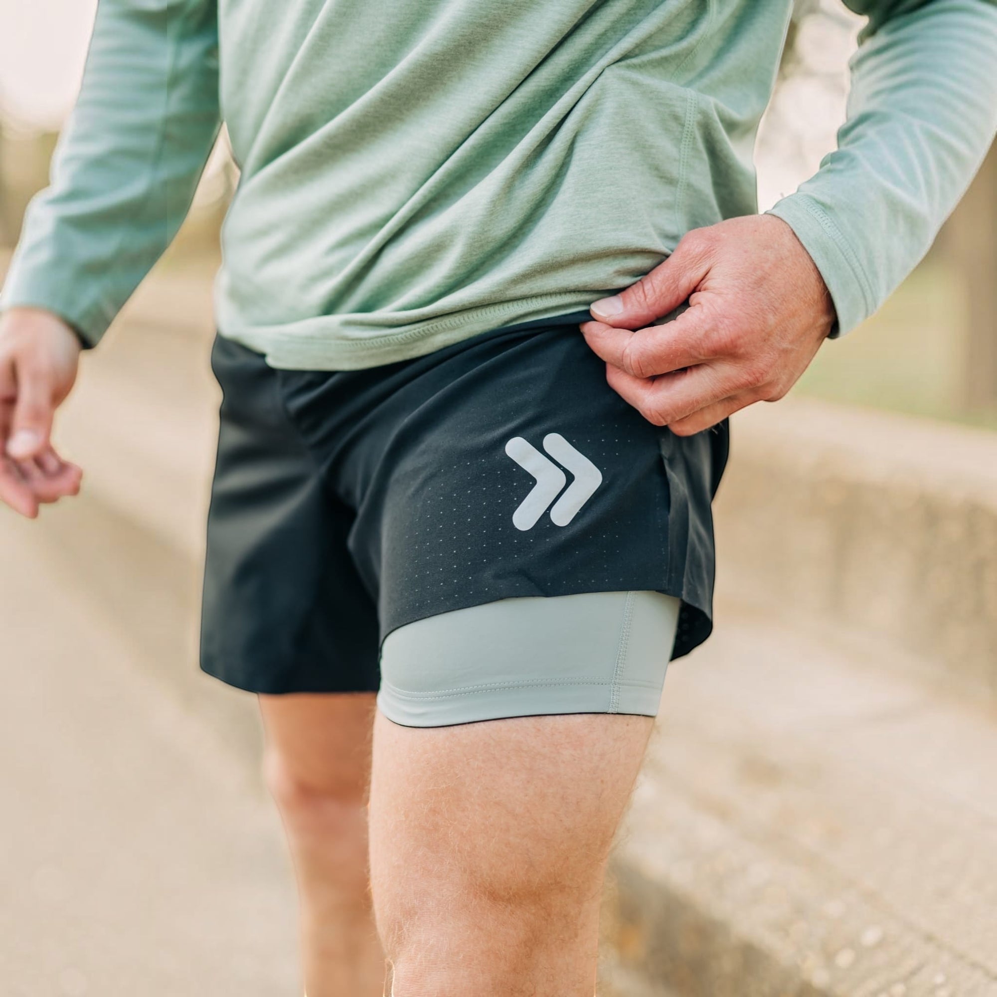 MOVE sport apparel Agility 6 inch black training shorts with grey boxer brief liner and reflective logo detail