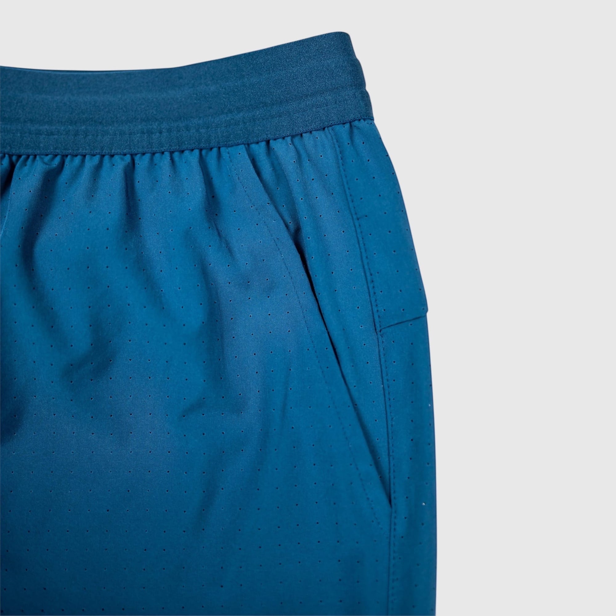 MOVE sport apparel Agility 6 inch training shorts in blue with perforated technical fabric and elastic waistband