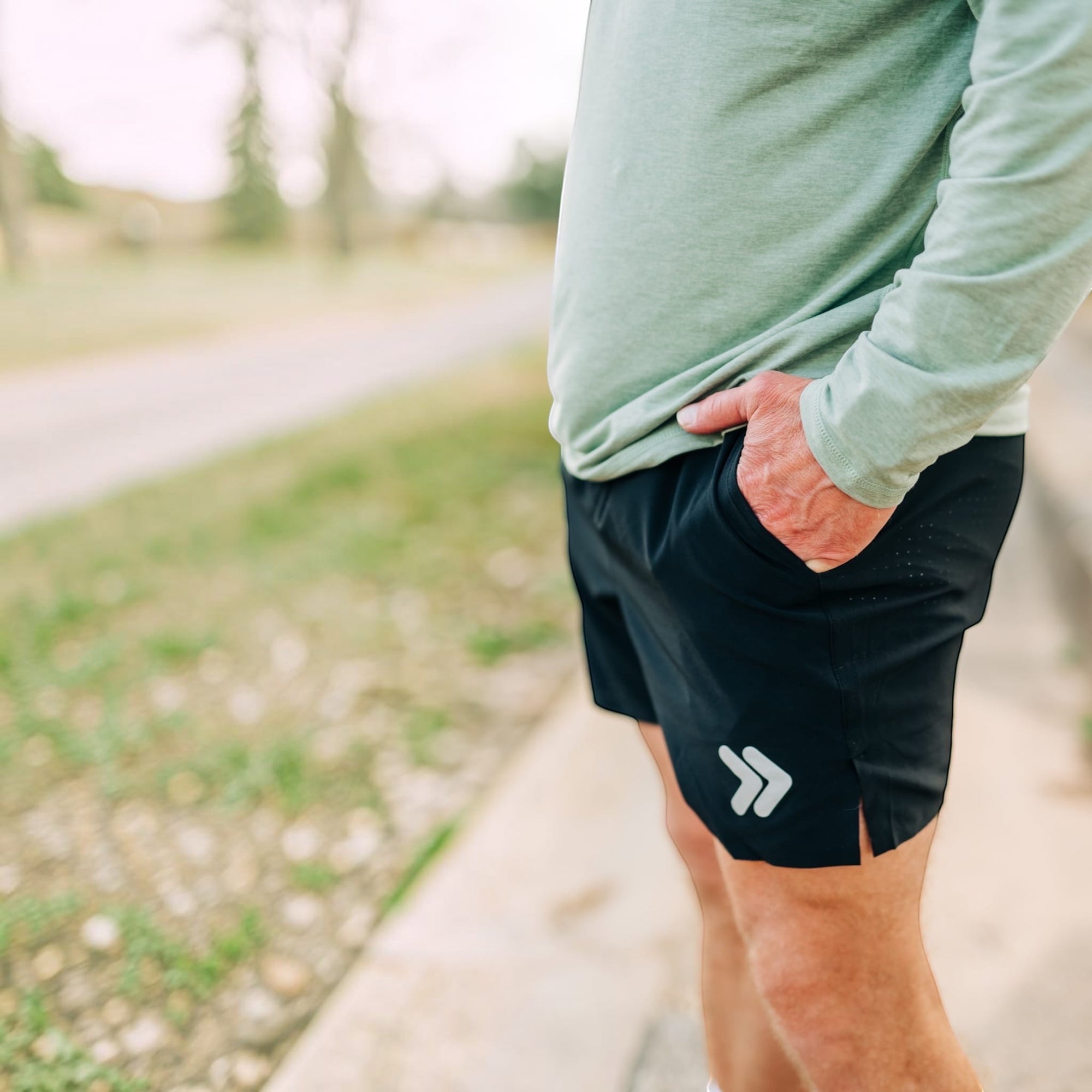 MOVE sport apparel Agility 6 inch training shorts in black with side slit and reflective logo detail