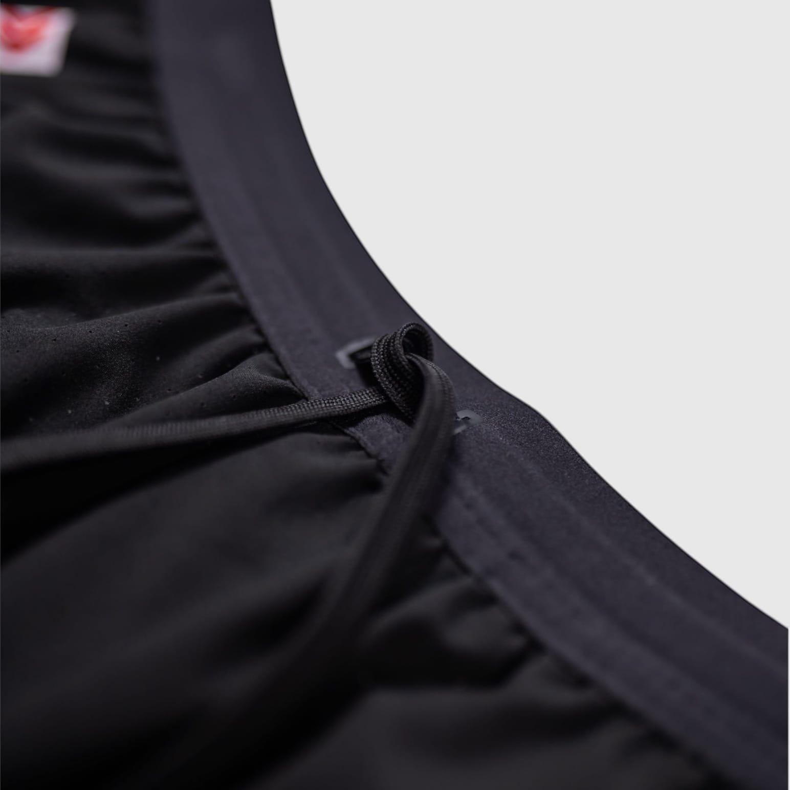 MOVE sport apparel black Agility training shorts featuring an elastic waistband with a secure drawstring closure