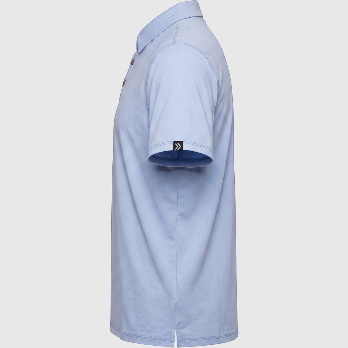 Side view of a light blue MOVE sport apparel Essential Polo Shirt in moisture-wicking fabric with a sleeve logo tab.