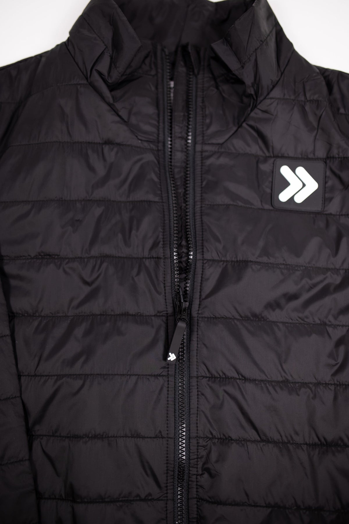 MOVE sport apparel men's black lightweight quilted down jacket with a stand-up collar and front zipper closure.