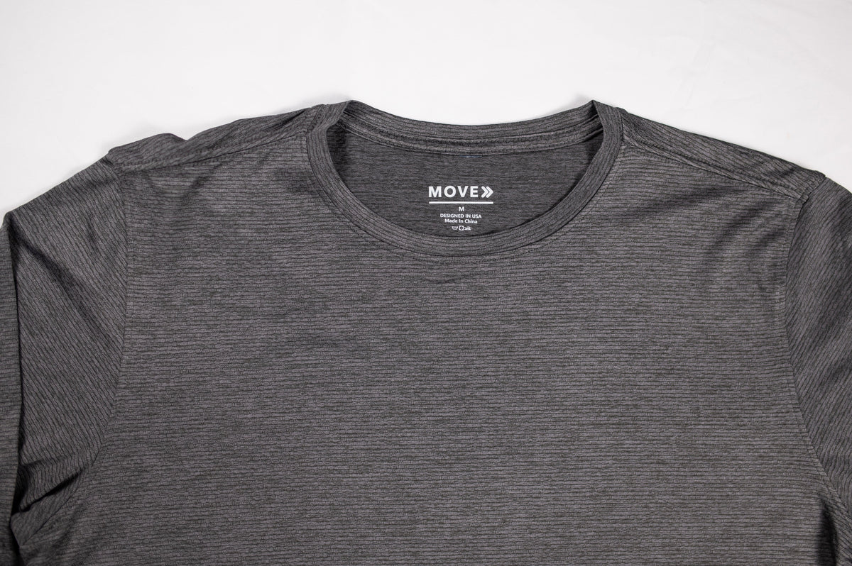 MOVE sport apparel Men's LuxDry long sleeve crew neck shirt in charcoal grey with subtle textured moisture-wicking fabric