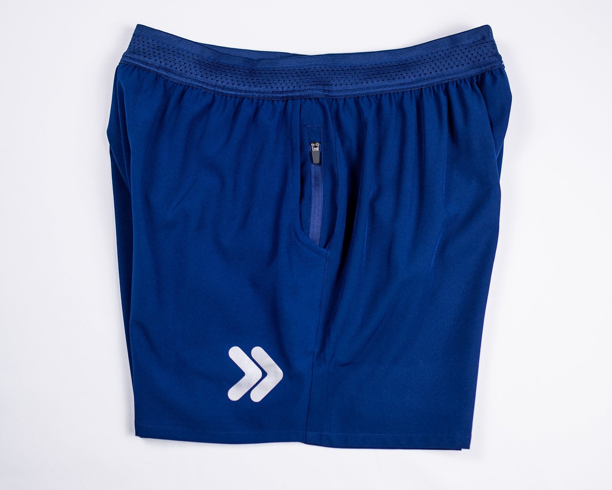 MOVE sport apparel men's blue running shorts with a breathable waistband, zippered pocket, and white logo detail.