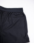 MOVE sport apparel black men's running shorts featuring a breathable waistband and a secure zippered back pocket.
