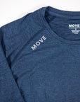 MOVE sport apparel Women's Essential long sleeve shirt in heathered blue with reflective shoulder logo detail.