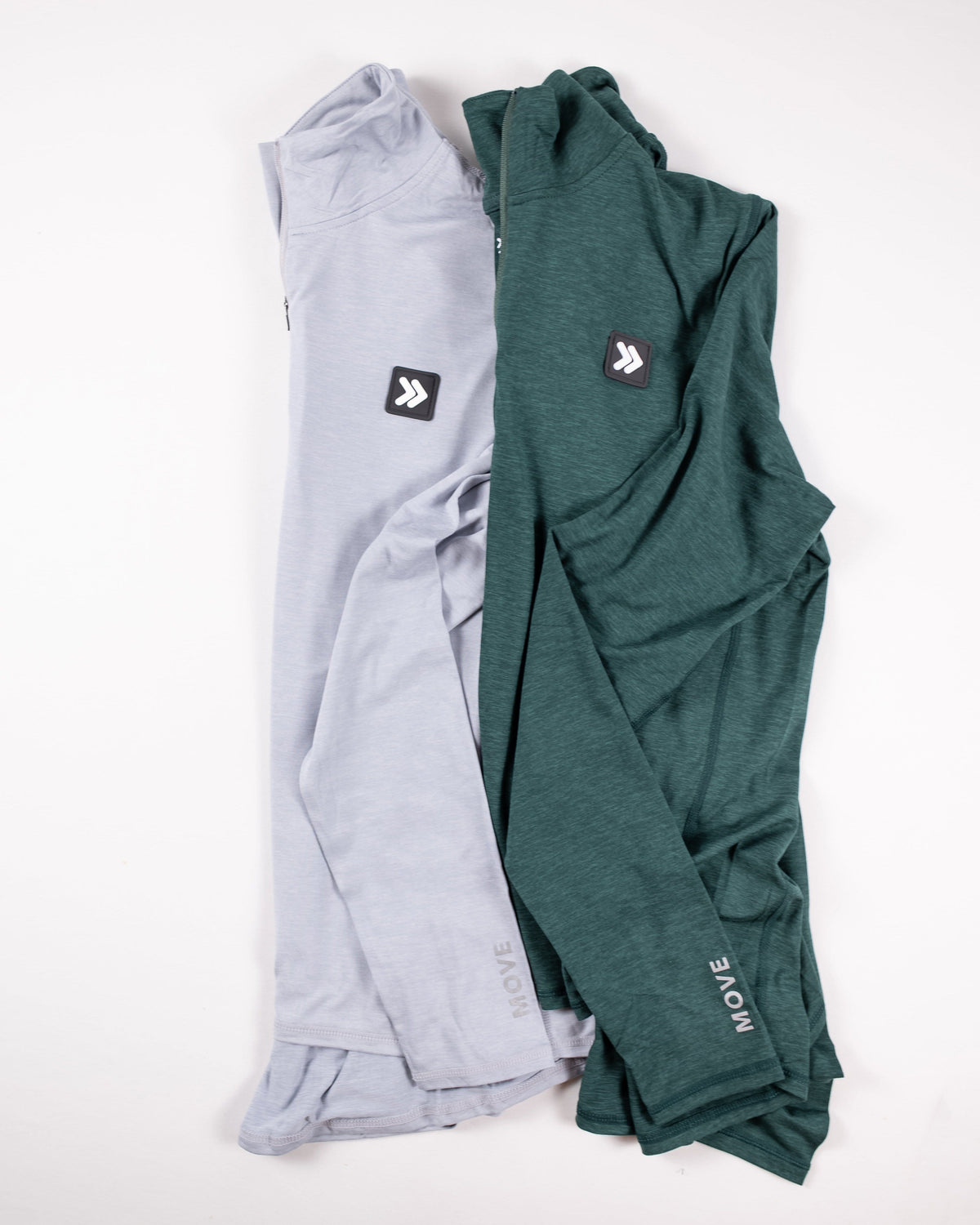 MOVE sport apparel women's essential quarter zip tops in light grey and dark green with reflective logo accents