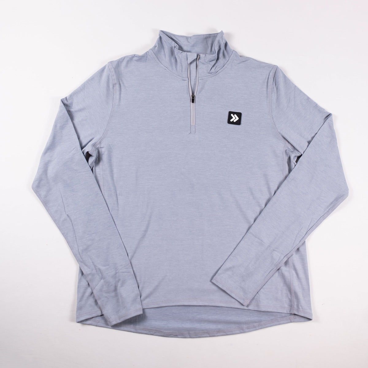 MOVE sport apparel women's light blue quarter zip pullover with reflective logo and long sleeves