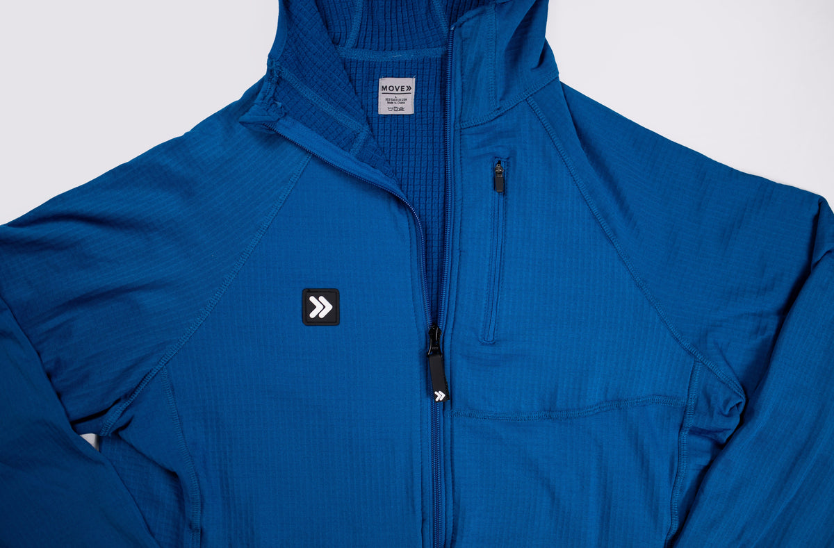 MOVE sport apparel blue waffle-knit full-zip hoodie with raglan sleeves and a zippered chest pocket.
